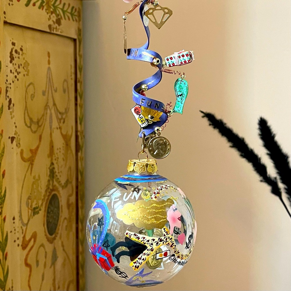 Silvestri hand painted ornament for someone who likes to “shop til you drop”